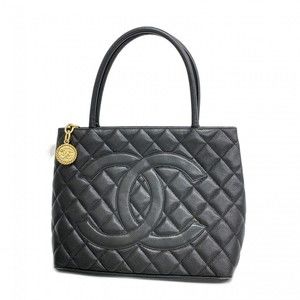 Chanel bag caviar skin tote black